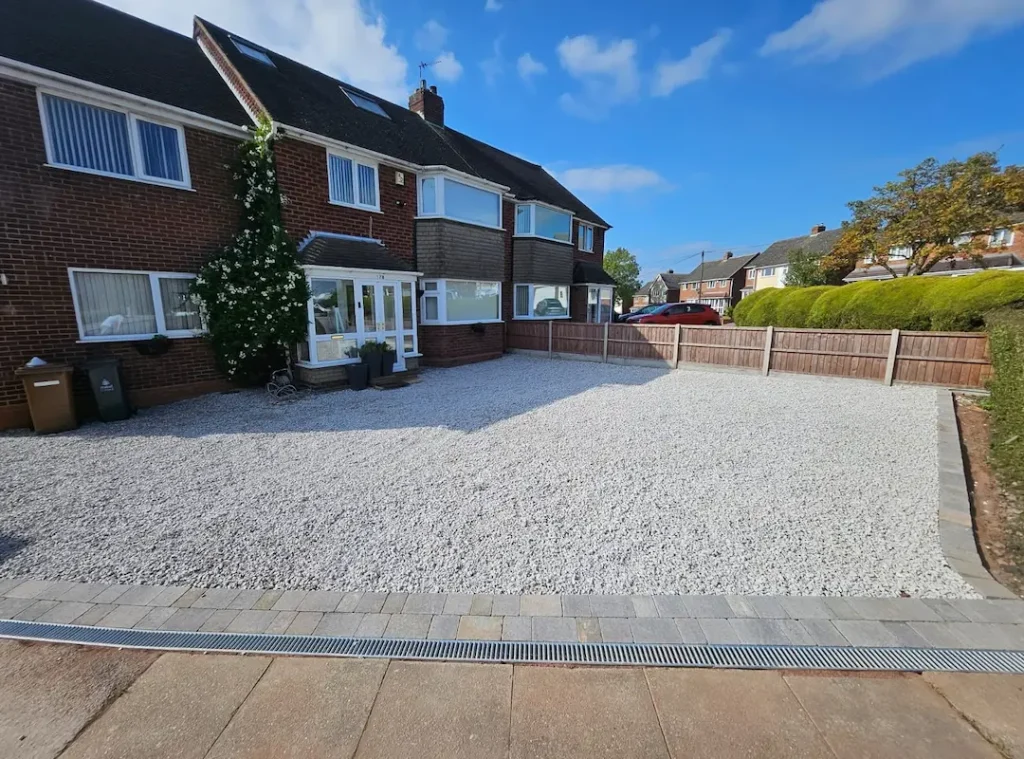 a house with gravel driveway
