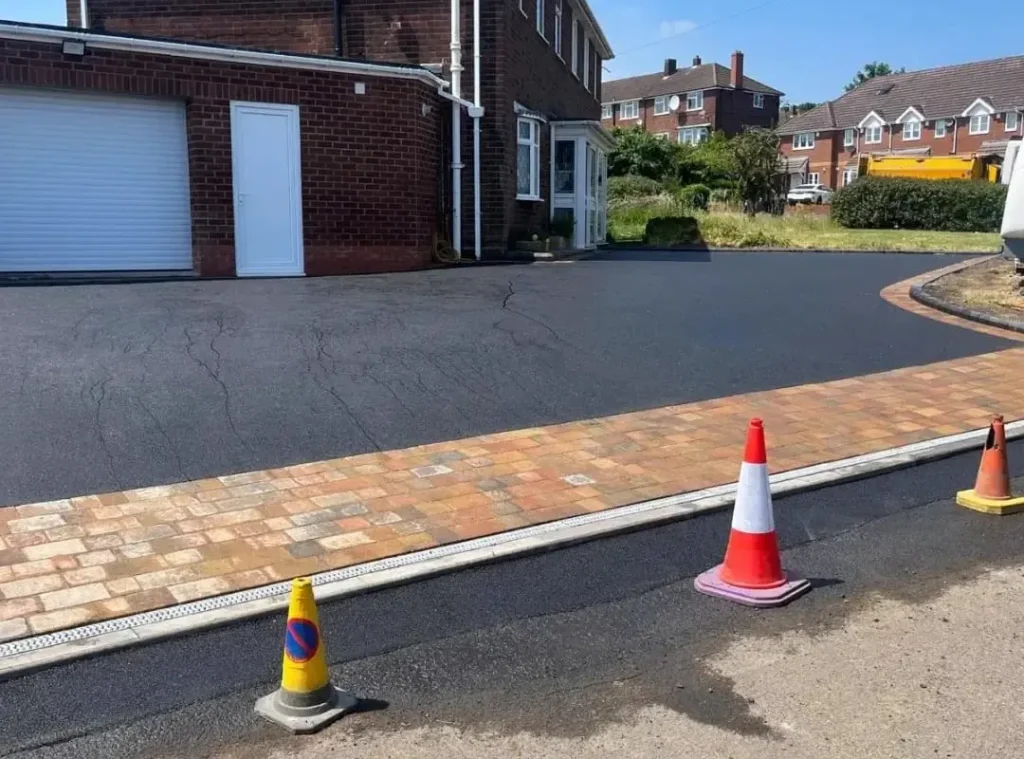 a road with cones on the side